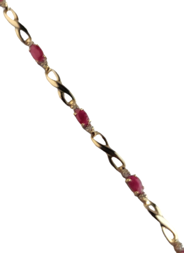 14k Ladies Yellow Gold Ruby Diamond infinity Bracelet