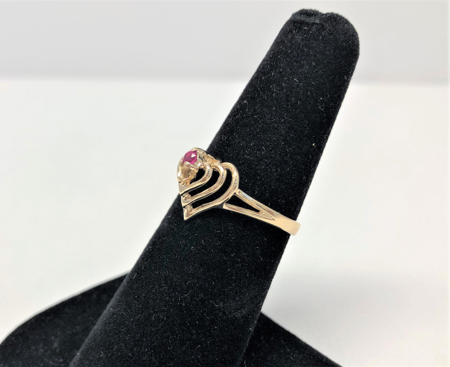 Ladies 14k yellow gold heart roll shape ruby ring - Luxury Diaz